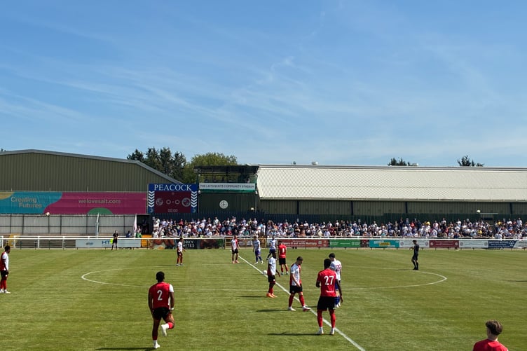 Action from Woking's pre-season friendly against Reading
