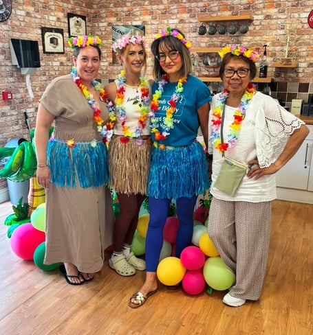 Bernard Sunley's Amy Wilemore, Monika Ahmed, Ewelina Wagner and Ester Manlubatan at the care home's aloha summer party