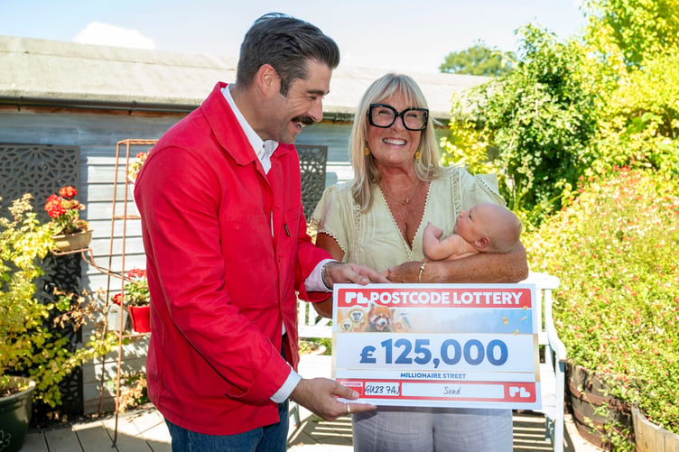 Postcode Lottery presentation - SEND - GU23 7AJ
Picture: winner Julie Hopwood
© Lucy Young for Postcode Lottery 2026