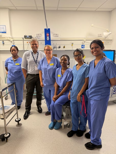 AHP workforce team: Francesca Paplow (L) and Sara Hill (R) TULA team: Sachin Agrawal (second from the left) with the TULA team
