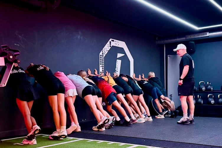 Former Marine Brian Stokes puts youngsters through their paces at his Farnham fitness class.