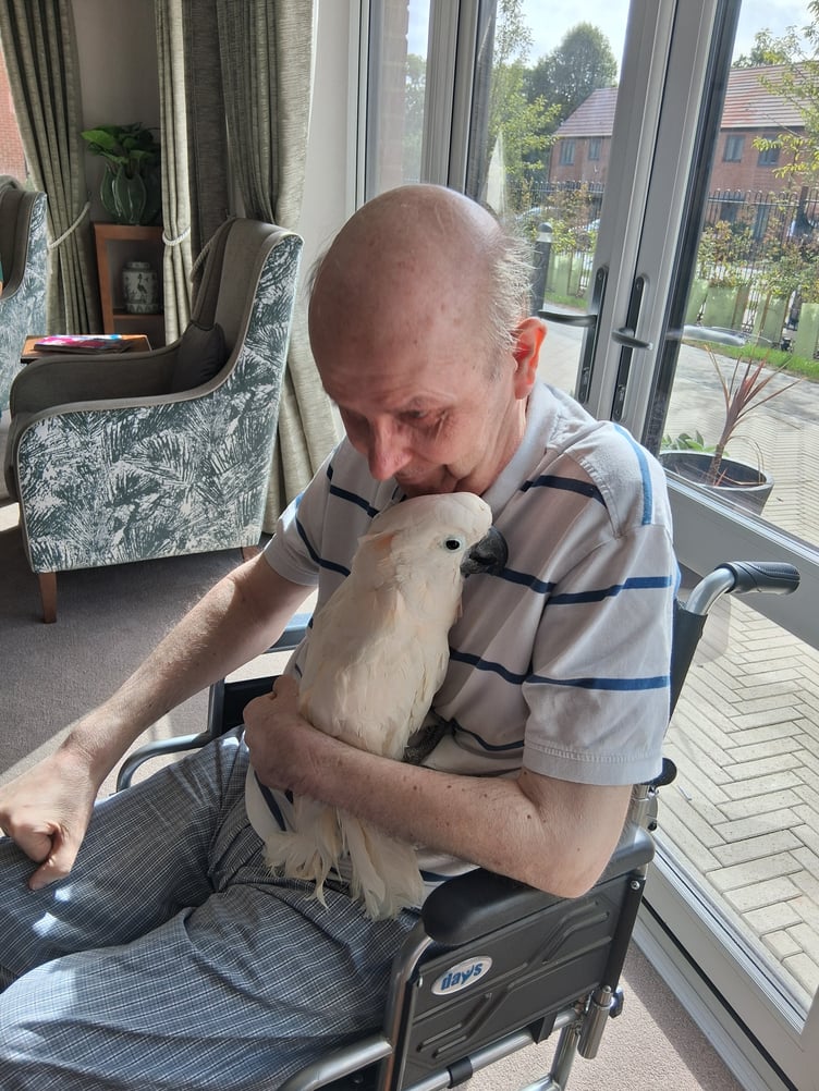 Nigel and parrot Rebecca