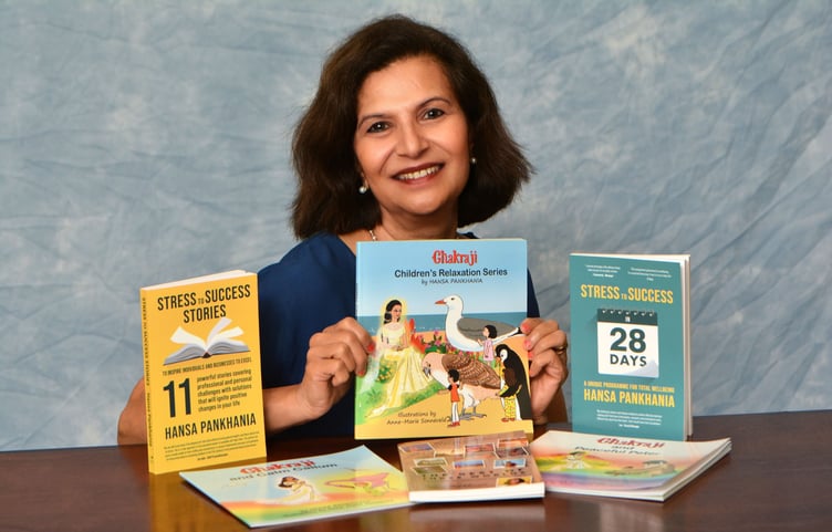 with a selection of her books promoting wellness