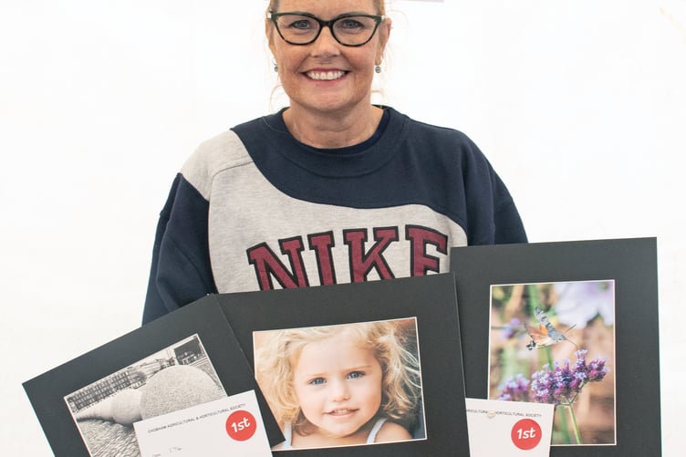 Sheridan May won three firsts in the photography classes to take the overall prize in the section – black and white print, portrait and reptiles, insects or flowers.