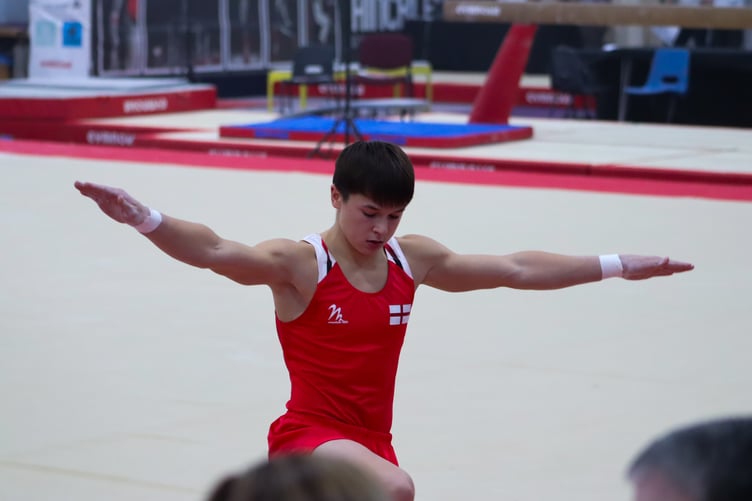 Woking gymnast Oli Porter in action