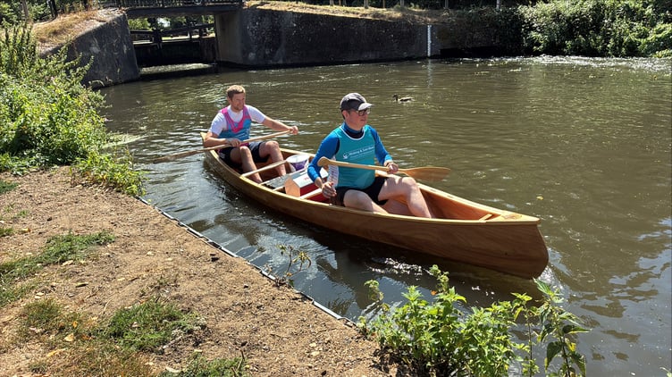 Tim and Rob canoe