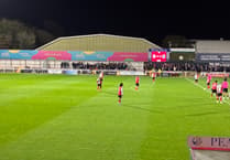 National League: Ten-man Woking beaten by leaders Boreham Wood